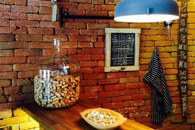 Craft Gin and exclusive brandies in unique distillery - The local food pairing: cheese, pancetta/prosciutto, anchovy, olives