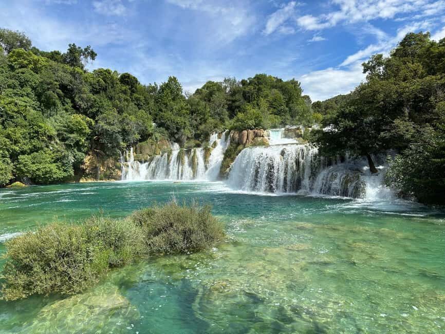 From Zadar: Krka Waterfalls Day Tour with Boat Ride & Guide - Panoramic boat ride: the part you remember later