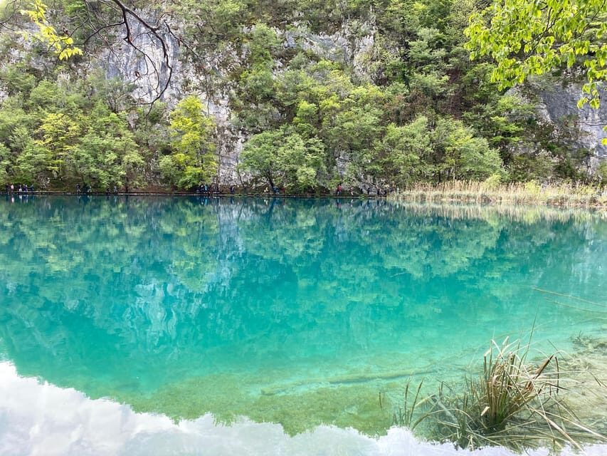 From Zadar: Plitvice Lakes Day Tour - The boat ride and panoramic train: your classic photo loop