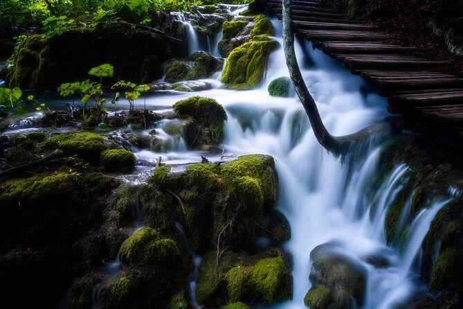 From Zadar: Plitvice Lakes Guided Day Tour with Tickets - The in-park electric train and boat ride: the break you’ll be glad you earned
