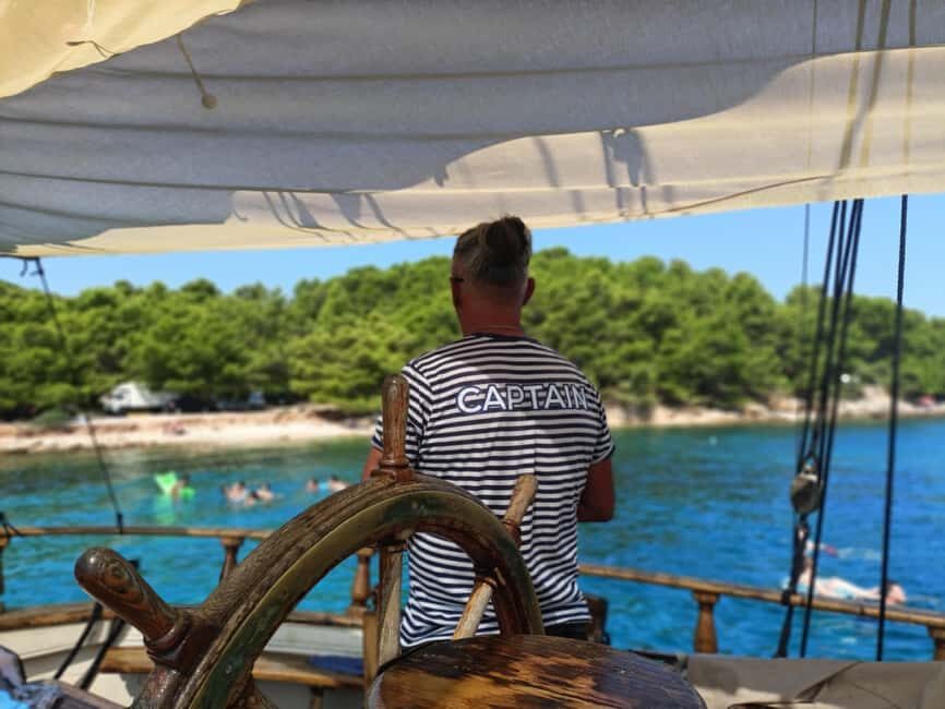 Zadar: Boat Tour with Unlimited Wine & 3 Stops - Unlimited white wine: how the drink setup changes the mood