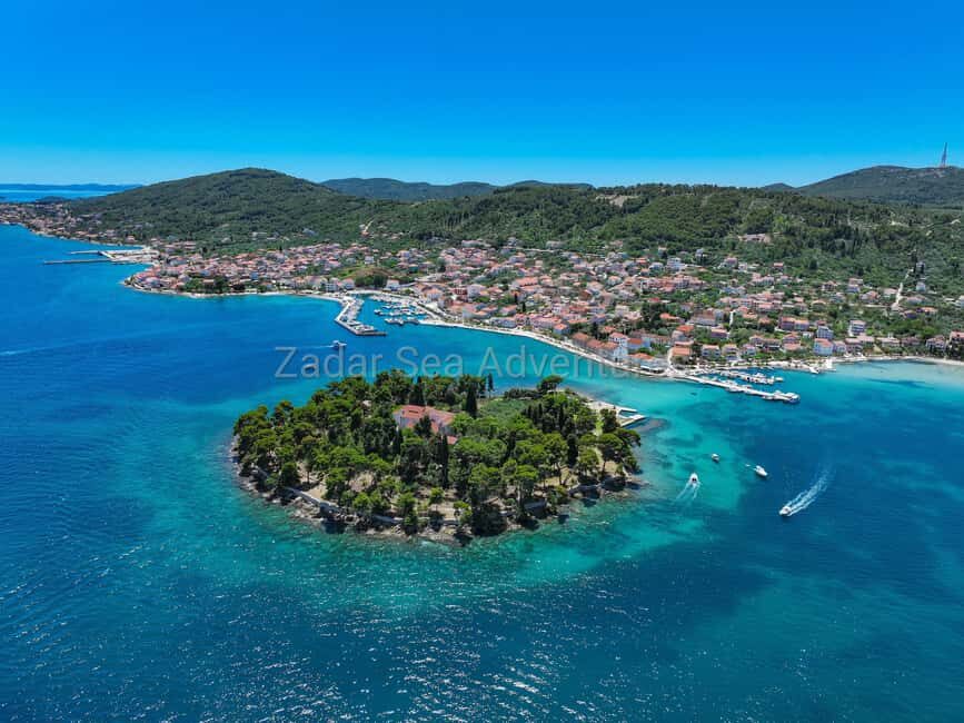 Zadar: Island Hopping Speedboat Adventure with Aperol Spritz - Onboard atmosphere: music, safety checks, and the skipper’s personality
