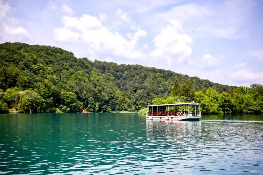 Zadar: Plitvice Lakes with Boat Ride and Zadar Old Town Tour - Inside Plitvice: walking loop, upper and lower waterfalls, and photo time