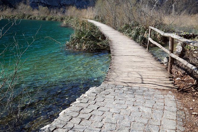 Zadar to Plitvice lakes: Guided tour with pre-booked tickets - Boat ride and electric train: why these included rides matter